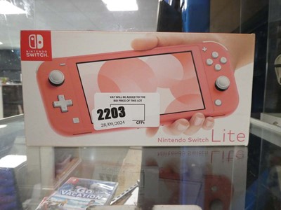 Lot 2203 - Boxed Nintendo Switch Lite in pink