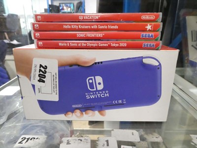 Lot 2204 - Boxed Nintendo Switch Lite in blue with 4...