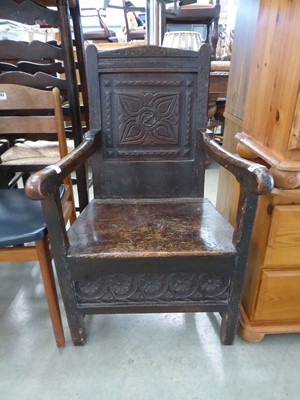 Lot 5104 - Oak hall chair with carved panels