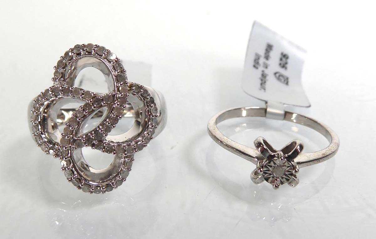 Lot 806 - A silver Gemporia cluster ring set small...