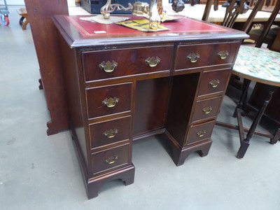 Lot 5179 - Reproduction mahogany knee hole desk