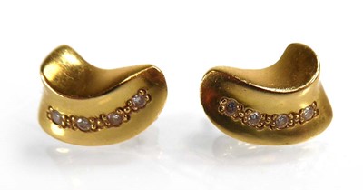 Lot A pair of 18ct yellow gold ear studs, each set...