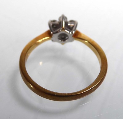 Lot An 18ct yellow gold cluster ring set seven...