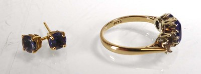 Lot A 9ct yellow gold ring set two oval tanzanite,...