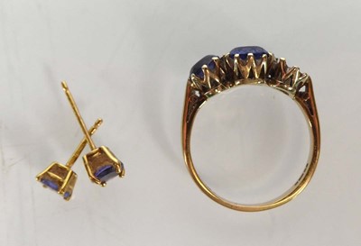 Lot A 9ct yellow gold ring set two oval tanzanite,...