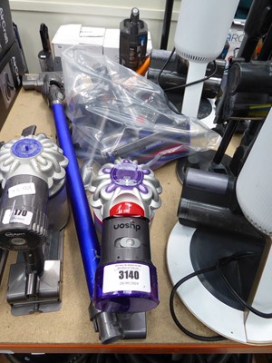 Lot 3140 - Handheld Dyson V8 with pole, head, various...