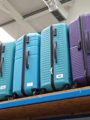 Lot 3232 - 2 large hard shelled American Tourister suitcases