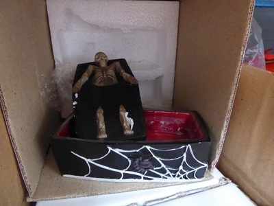 Lot 3253 - 2 boxes of skeleton and coffin ornaments