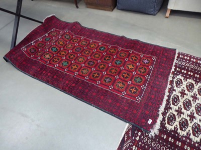 Lot 5316 - Red floral patterned carpet