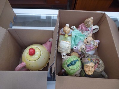 Lot 5323 - 2 boxes containing novelty teapots and...