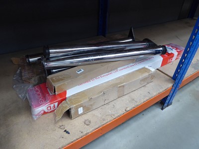 Lot 4548 - An assortment of stainless steel table legs,...