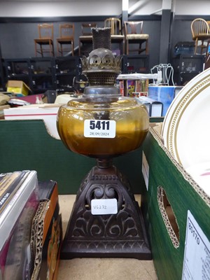 Lot 5411 - Metal oil lamp with glass reservoir