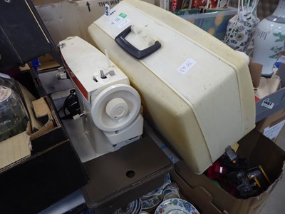 Lot 5470 - Cased Singer electric sewing machine