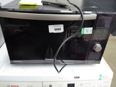 Lot 6009 - Panasonic black microwave