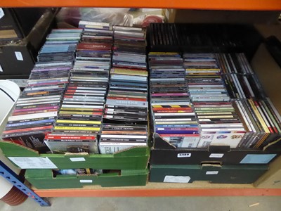 Lot 5489 - 4 boxes containing CDs and DVDs