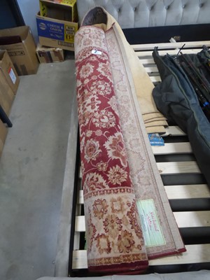 Lot 5519 - Maroon floral carpet, plus 1 other