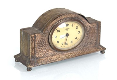 Lot 84 - A 20th century German timepiece in a hammered...