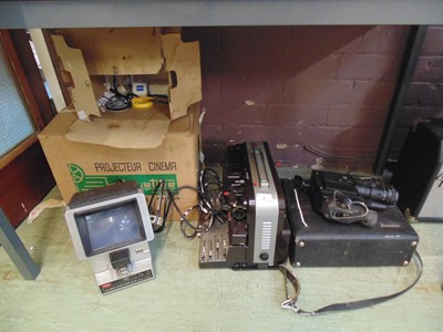 Lot 4 - A mid-20th century projector, camera, and...