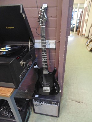 Lot 10 - An Encore electric guitar together with a...