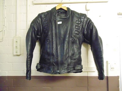 Lot 12 - A black leather motorcycle jacket (40) and...