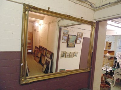 Lot 14 - A large gilt framed rectangular wall mirror