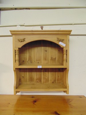 Lot 25 - A wall mounted pine shelving unit