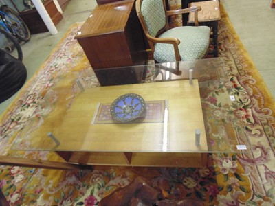 Lot 33 - A modern glass topped rectangular coffee table...