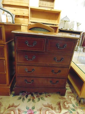 Lot 44 - A reproduction mahogany chest of two short...