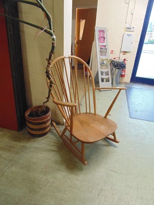 Lot 48 - A light Ercol spindle back rocking chair (A/F)