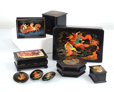 Lot 101 - A group of five Russian black lacquered boxes...