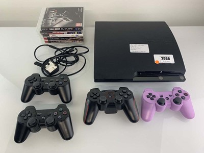 Lot Sony PlayStation 3 Slim with 5x games and 4x...