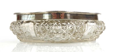 Lot 427 - An early 20th century silver mounted glass...