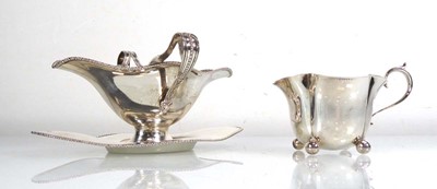 Lot 428 - An Edwardian silver double ended sauce boat...