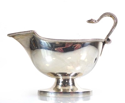 Lot 429 - A silver and parcel gilt sauce boat with...