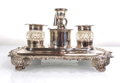 Lot 432 - A George IV silver two bottle desk stand with...