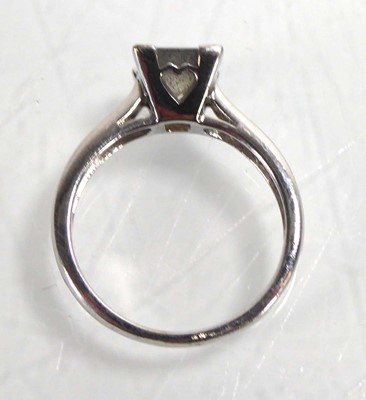 Lot A 9ct white gold ring set square cut...