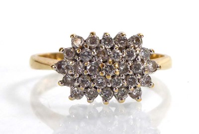 Lot An 18ct yellow gold ring set small diamonds,...