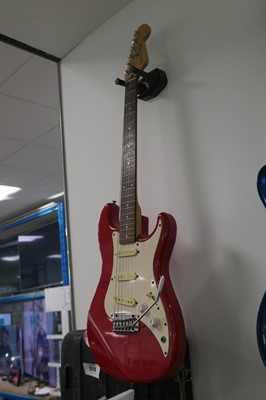 Lot 2273 - 6 string Squier Bullet electric guitar in red...