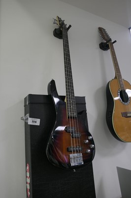 Lot 2274 - 4 string bass guitar with wood effect finish,...