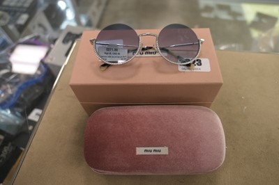 Lot 2323 - Pair of Miumiu sunglasses in a box