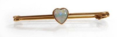 Lot A yellow metal bar brooch set heart shaped...