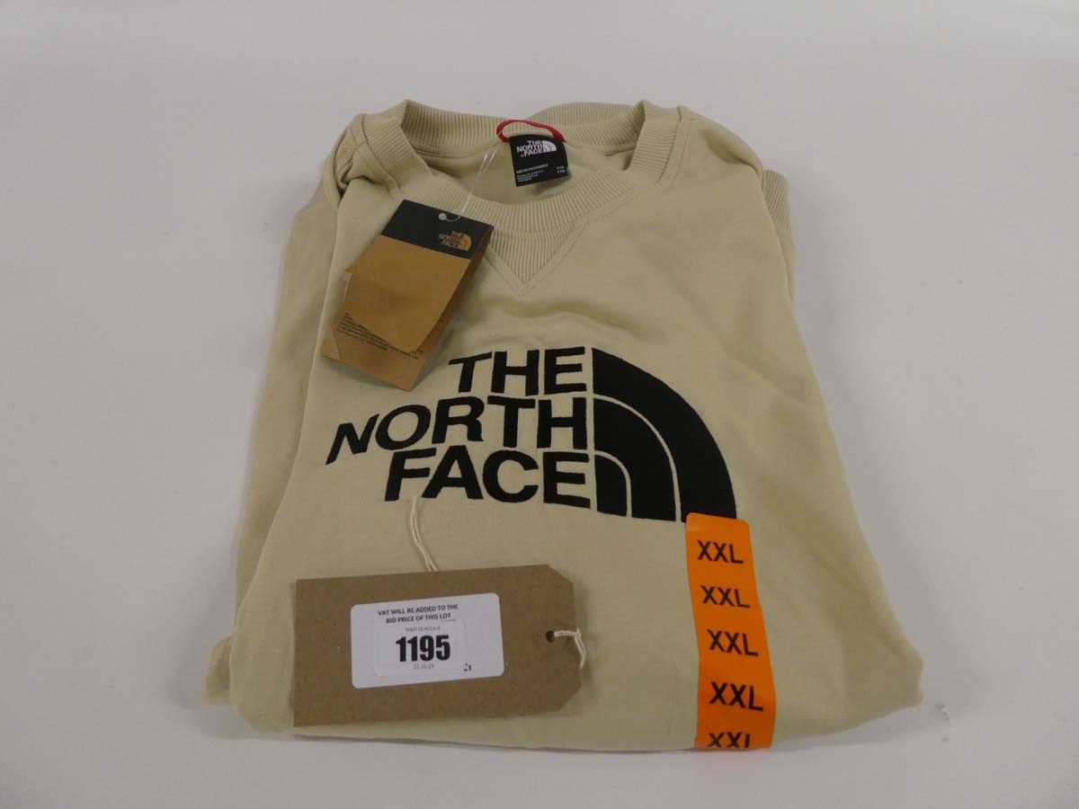 Lot 1195 - The North Face jumper in beige. Size: XXL.