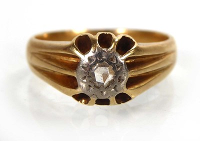 Lot A yellow metal ring set small diamond in an...