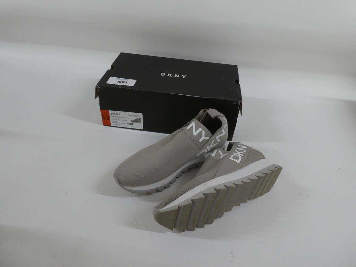 Lot 1433 - A boxed pair of women's DKNY slip on shoes in...