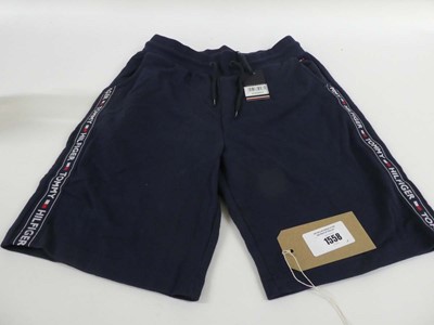 Lot 1558 - A pair of Tommy Hilfiger shorts in navy. Size:...