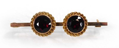 Lot A yellow metal bar brooch set two garnets...