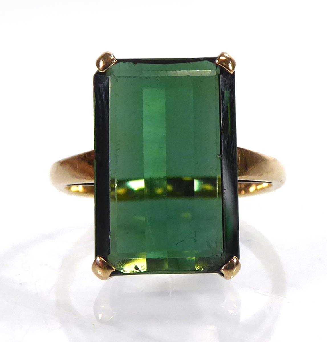 Lot A 9ct yellow gold ring set rectangular green...