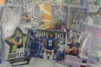 Lot Assortment of NFL Trading cards to include...