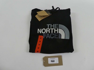 Lot 1582 - The North Face hooded jumper in black size medium