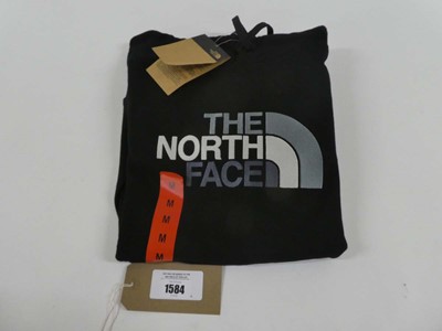 Lot 1584 - The North Face hooded jumper in black size medium